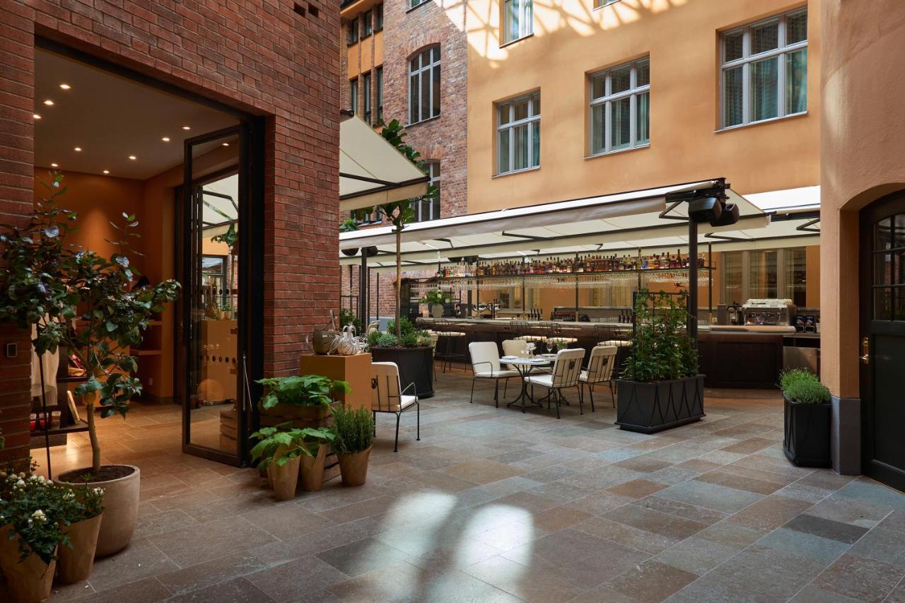 Villa Dagmar Stockholm Exterior foto The courtyard of the hotel